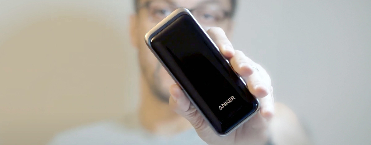 man holding anker power bank